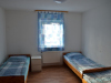 Schlafzimmer mit Einzelbetten - Unterkunft + Hungen